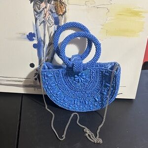 Made in India beaded half moon crossbody and handle bag